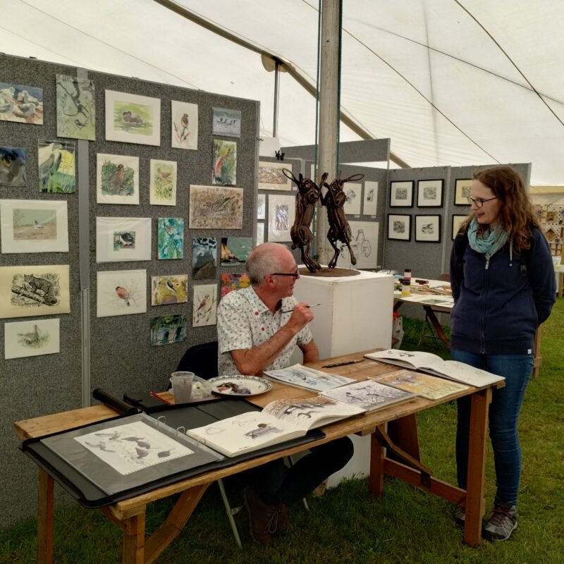   Richard Allen demonstrates his painting techniques